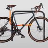 tex–lock eyelet orange mit U-Lock sichert Rahmen, Räder und Sattel an Gegenstand